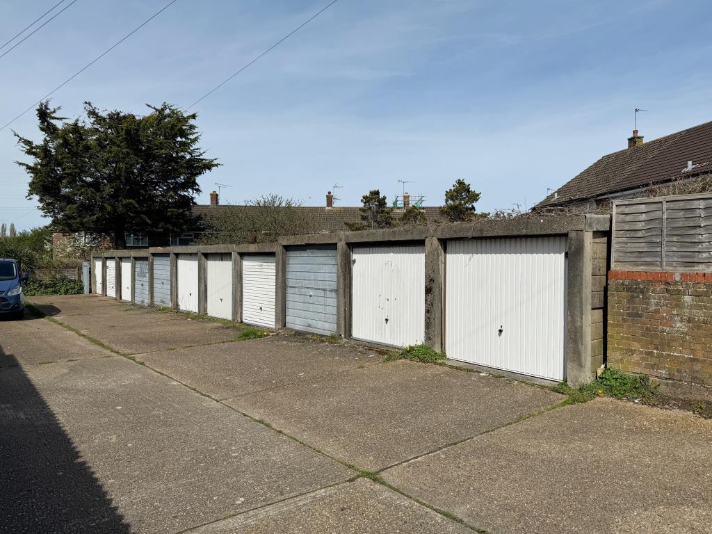 Lot: 96 - TWENTY-FOUR LOCK-UP GARAGES - View of right hand side terrace of garages